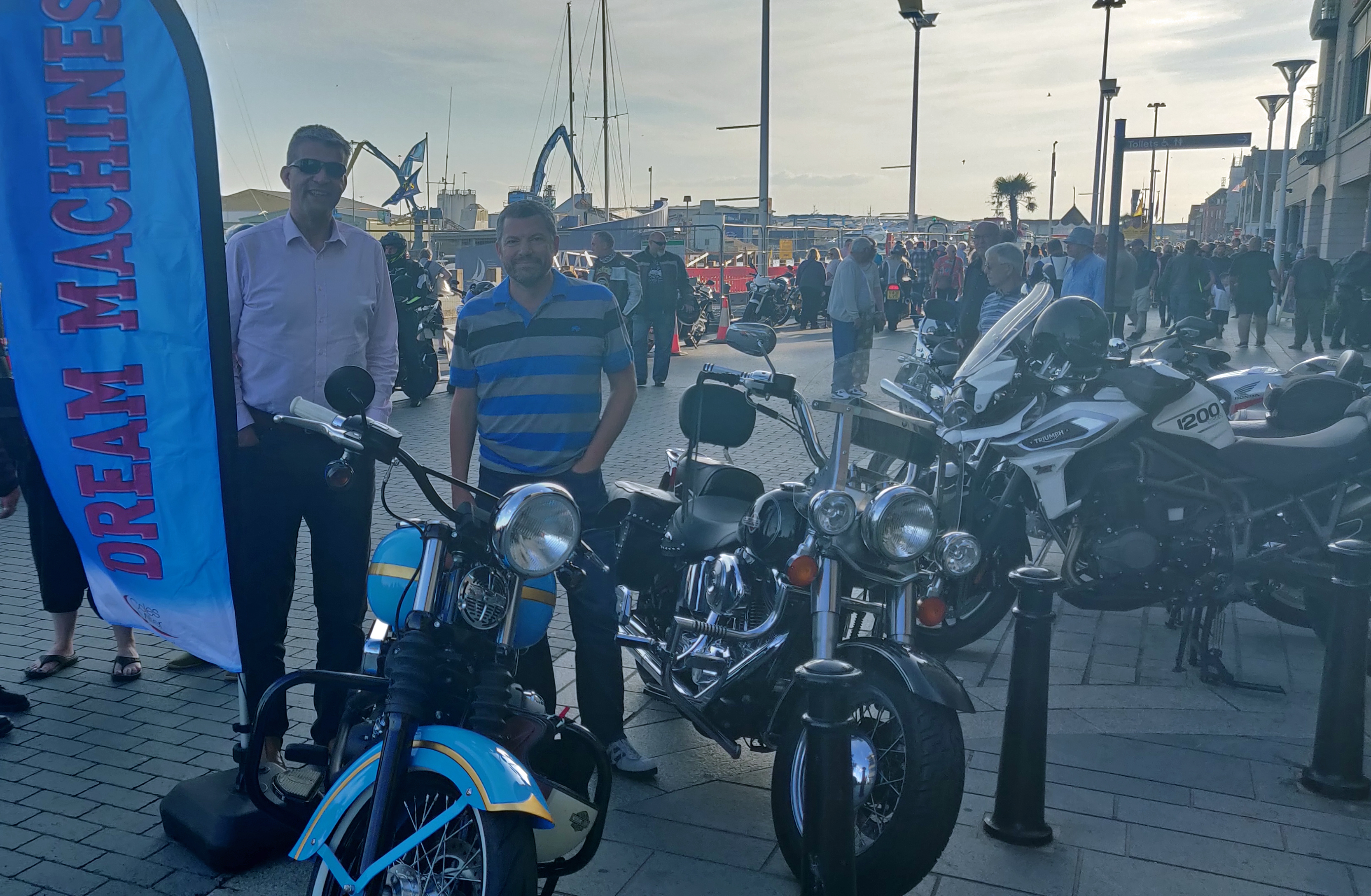 Bike of the Night winner pictured with motorbike on Poole Quay